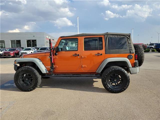 used 2011 Jeep Wrangler Unlimited car, priced at $16,985