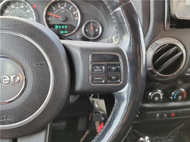 used 2011 Jeep Wrangler Unlimited car, priced at $16,985