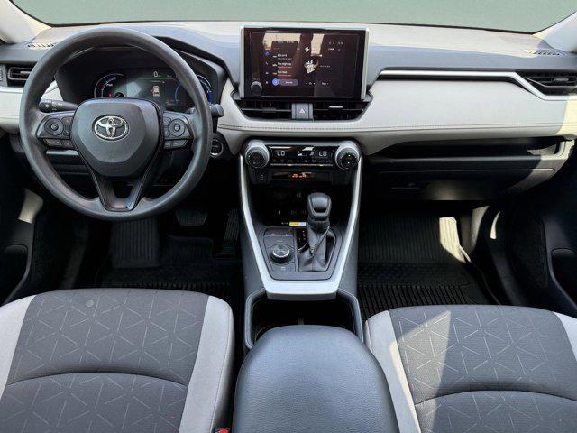 used 2024 Toyota RAV4 Hybrid car, priced at $32,000