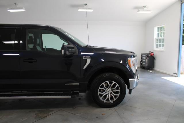 used 2021 Ford F-150 car, priced at $34,236