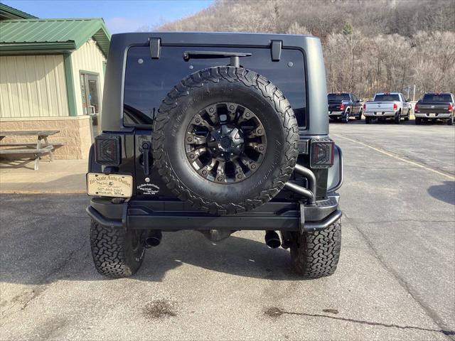 used 2015 Jeep Wrangler Unlimited car, priced at $14,990