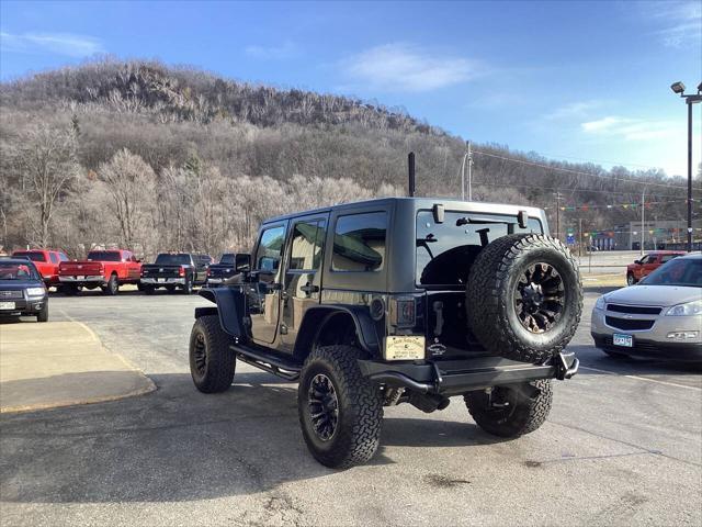 used 2015 Jeep Wrangler Unlimited car, priced at $14,990