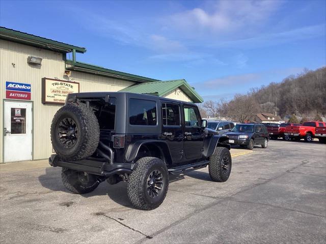 used 2015 Jeep Wrangler Unlimited car, priced at $14,990