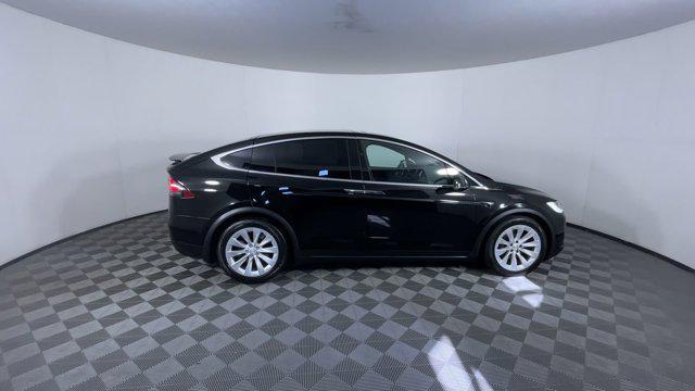 used 2018 Tesla Model X car, priced at $28,861
