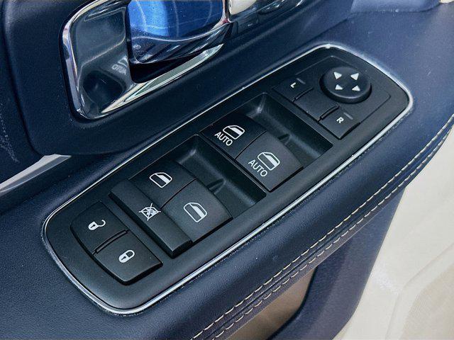 used 2018 Ram 1500 car, priced at $30,803