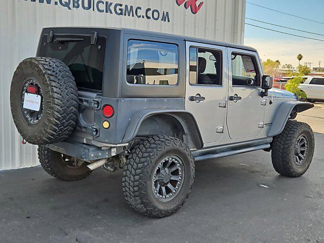 used 2014 Jeep Wrangler Unlimited car, priced at $21,011