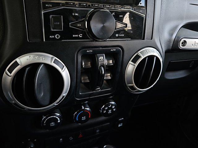 used 2014 Jeep Wrangler Unlimited car, priced at $21,011