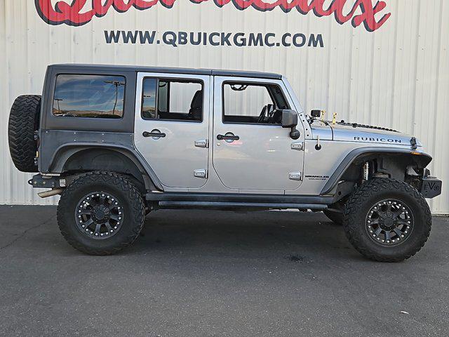 used 2014 Jeep Wrangler Unlimited car, priced at $21,011