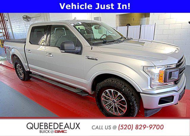 used 2018 Ford F-150 car, priced at $23,444