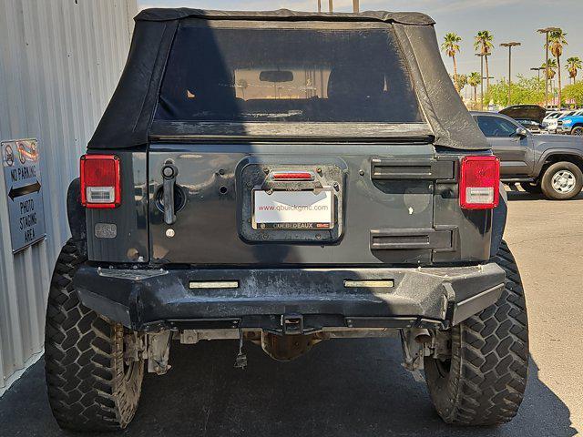 used 2016 Jeep Wrangler Unlimited car, priced at $18,944