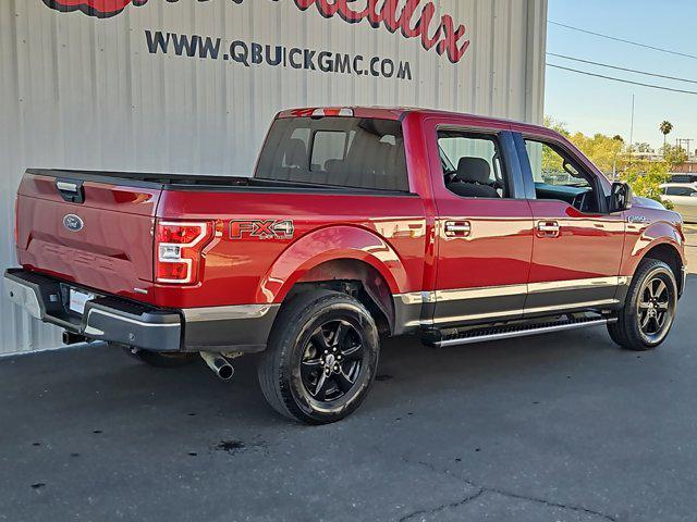 used 2018 Ford F-150 car, priced at $23,388