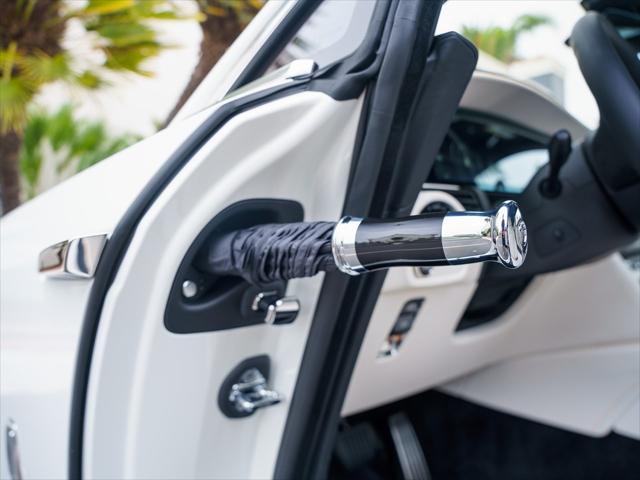 new 2025 Rolls-Royce Spectre car, priced at $504,725