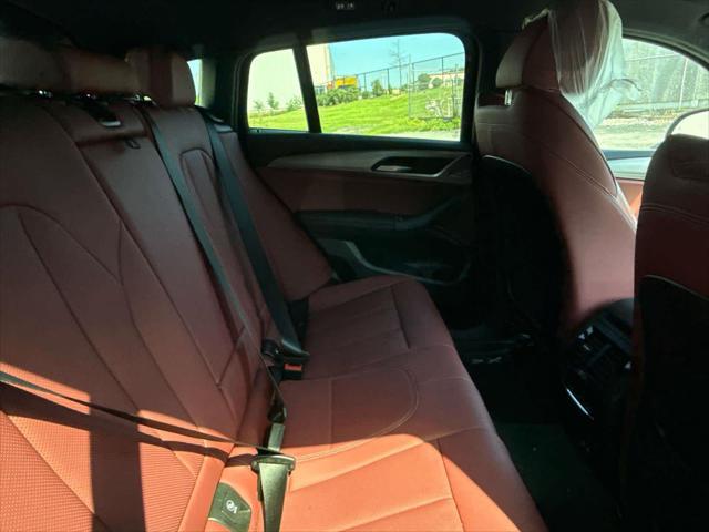used 2025 BMW X4 car, priced at $50,000