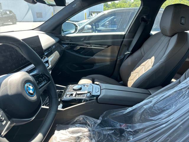 used 2025 BMW i5 car, priced at $60,000