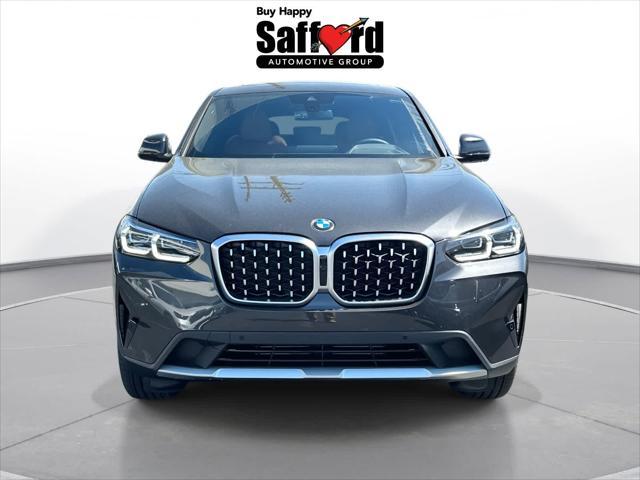 used 2025 BMW X4 car, priced at $56,000