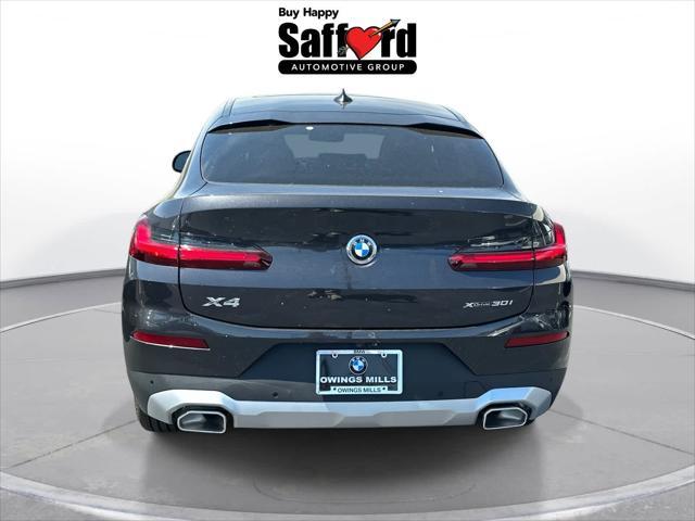 used 2025 BMW X4 car, priced at $56,000