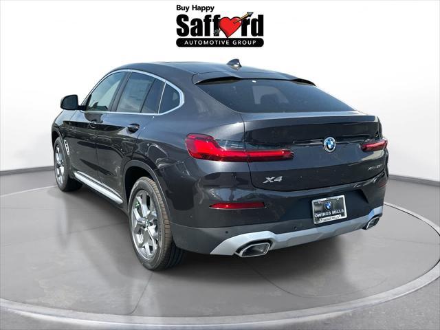 used 2025 BMW X4 car, priced at $56,000