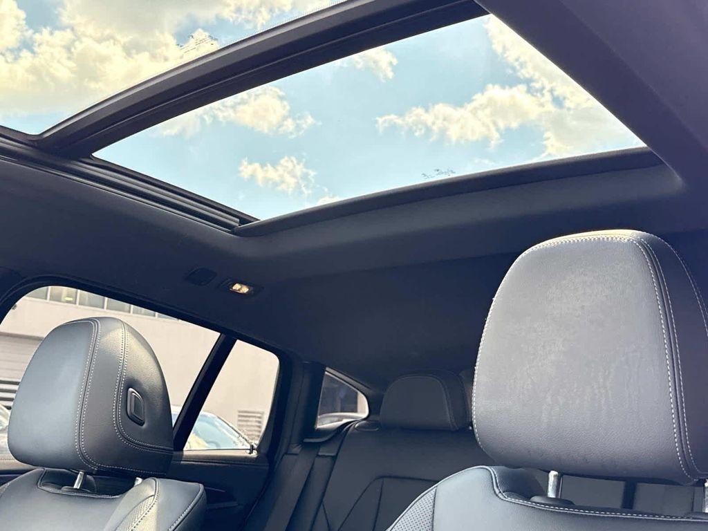 used 2023 BMW X4 car, priced at $51,900