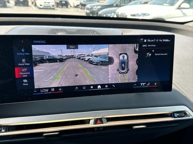 used 2024 BMW iX car, priced at $69,900