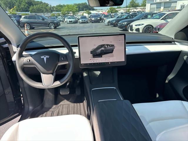 used 2023 Tesla Model Y car, priced at $34,900