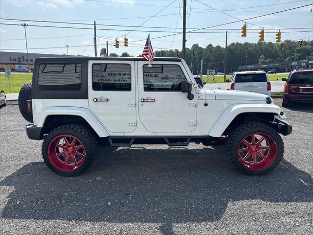 used 2015 Jeep Wrangler Unlimited car, priced at $18,995