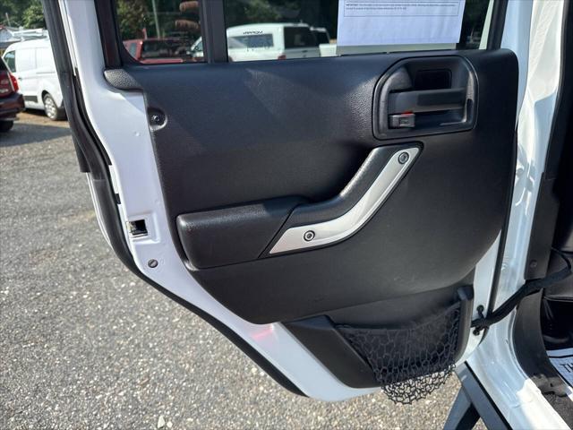 used 2015 Jeep Wrangler Unlimited car, priced at $18,995