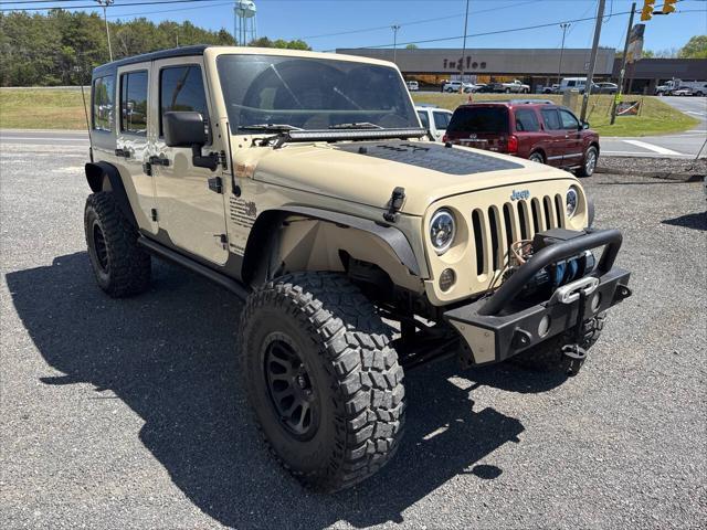 used 2012 Jeep Wrangler Unlimited car, priced at $16,995