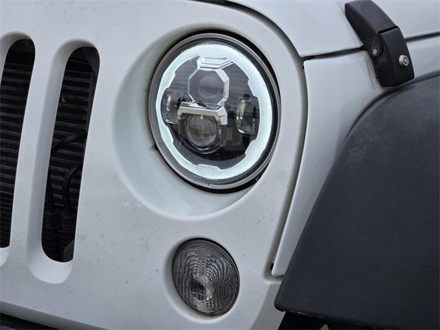 used 2016 Jeep Wrangler Unlimited car, priced at $17,792