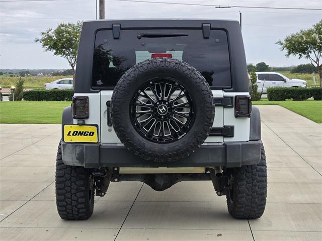 used 2016 Jeep Wrangler Unlimited car, priced at $17,792