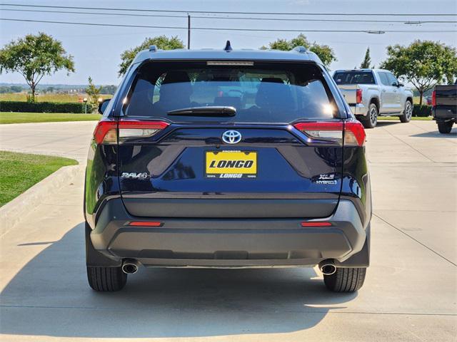 used 2024 Toyota RAV4 Hybrid car, priced at $32,991