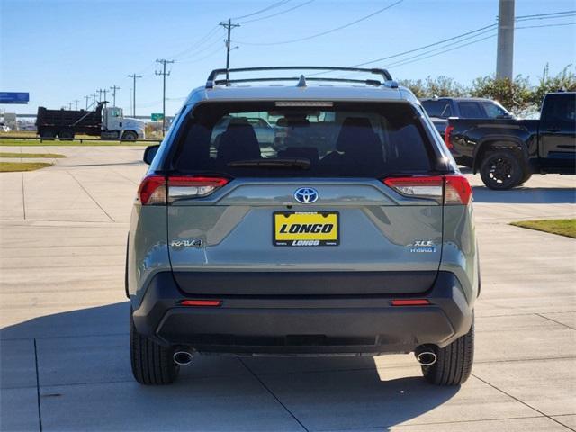 used 2021 Toyota RAV4 Hybrid car, priced at $29,291