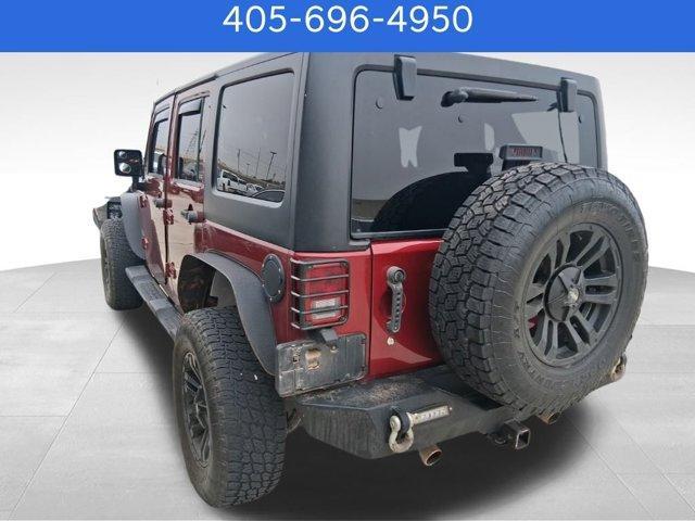 used 2013 Jeep Wrangler Unlimited car, priced at $15,570