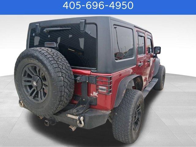 used 2013 Jeep Wrangler Unlimited car, priced at $15,570