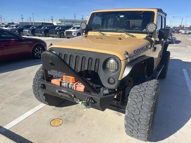 used 2014 Jeep Wrangler Unlimited car, priced at $17,474