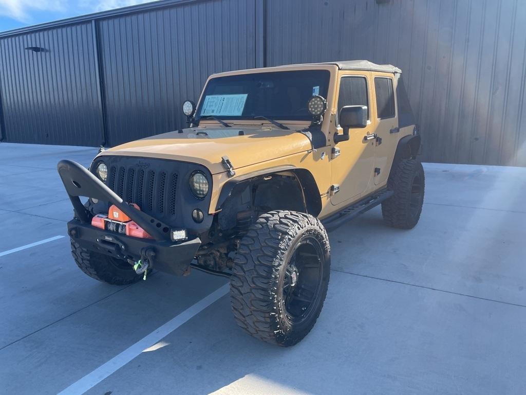 used 2014 Jeep Wrangler Unlimited car, priced at $14,974