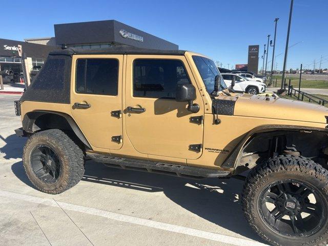 used 2014 Jeep Wrangler Unlimited car, priced at $17,474