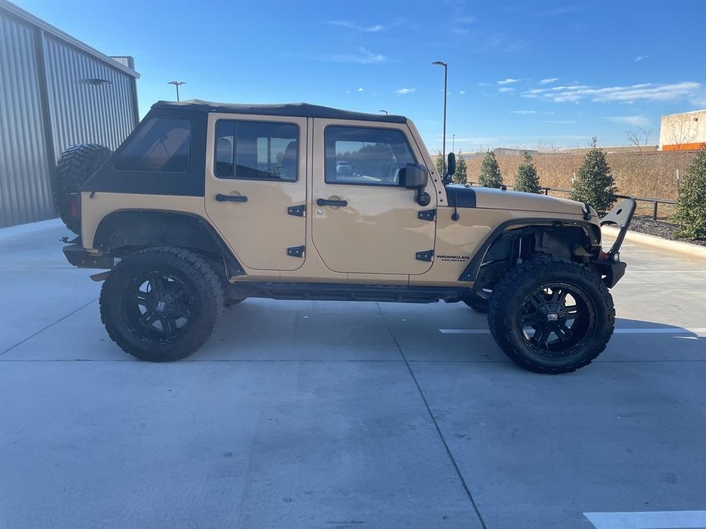 used 2014 Jeep Wrangler Unlimited car, priced at $14,974