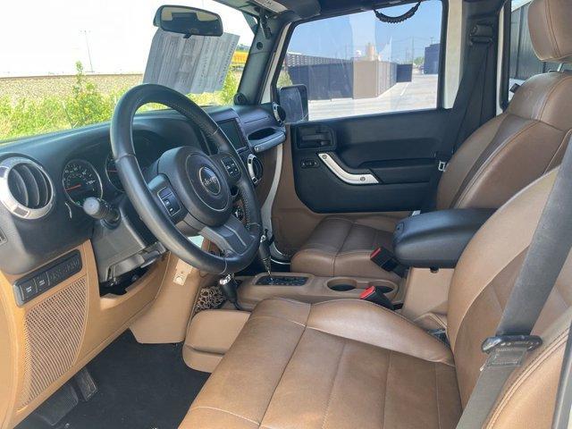 used 2011 Jeep Wrangler Unlimited car, priced at $16,234