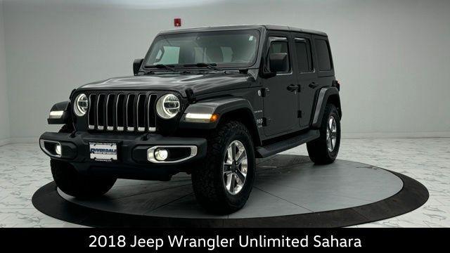 used 2018 Jeep Wrangler Unlimited car, priced at $23,271