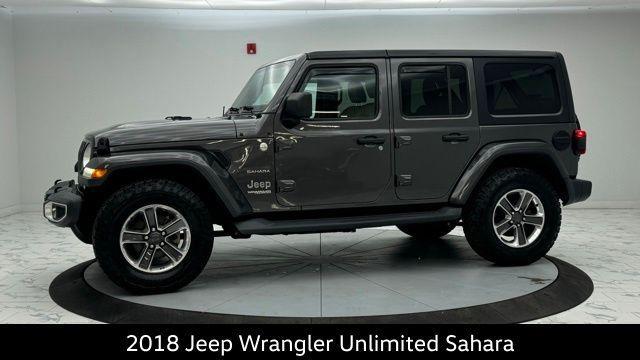 used 2018 Jeep Wrangler Unlimited car, priced at $23,271