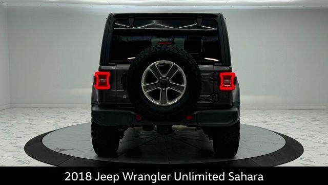 used 2018 Jeep Wrangler Unlimited car, priced at $23,271