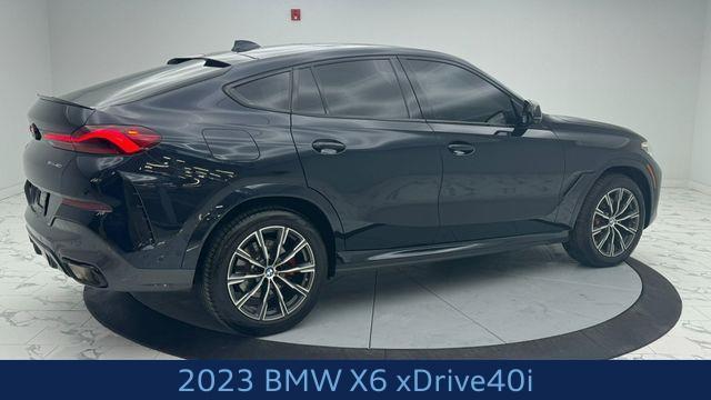 used 2023 BMW X6 car, priced at $54,867