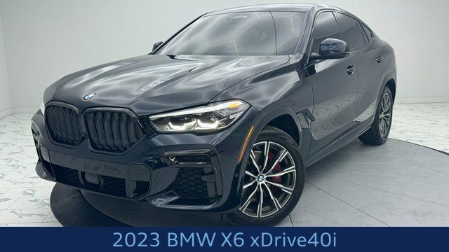 used 2023 BMW X6 car, priced at $58,243