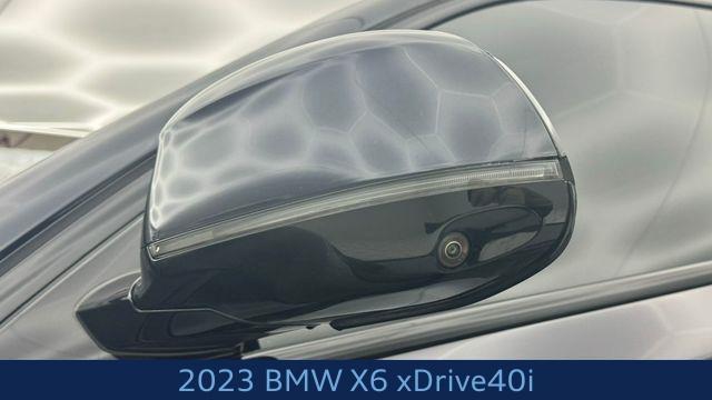 used 2023 BMW X6 car, priced at $55,219