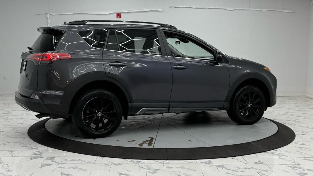 used 2018 Toyota RAV4 car, priced at $19,552