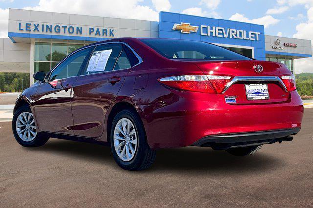 used 2015 Toyota Camry car, priced at $18,000