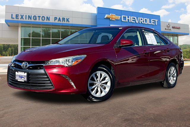 used 2015 Toyota Camry car, priced at $18,000