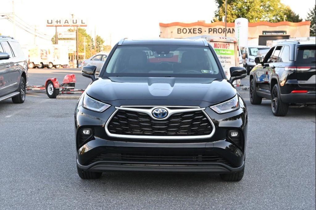 used 2021 Toyota Highlander Hybrid car, priced at $31,500