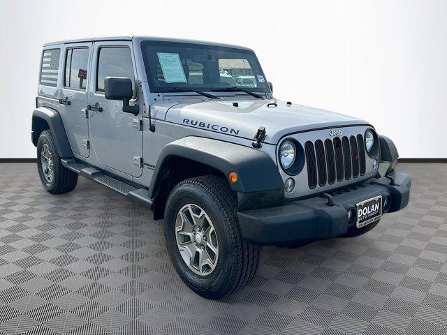used 2014 Jeep Wrangler Unlimited car, priced at $22,991