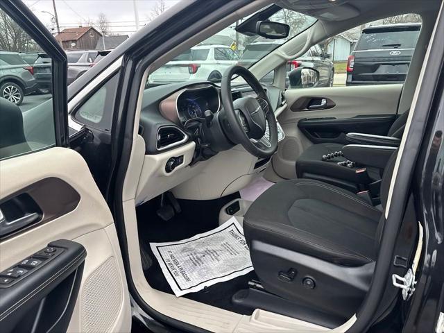 used 2023 Chrysler Voyager car, priced at $22,860